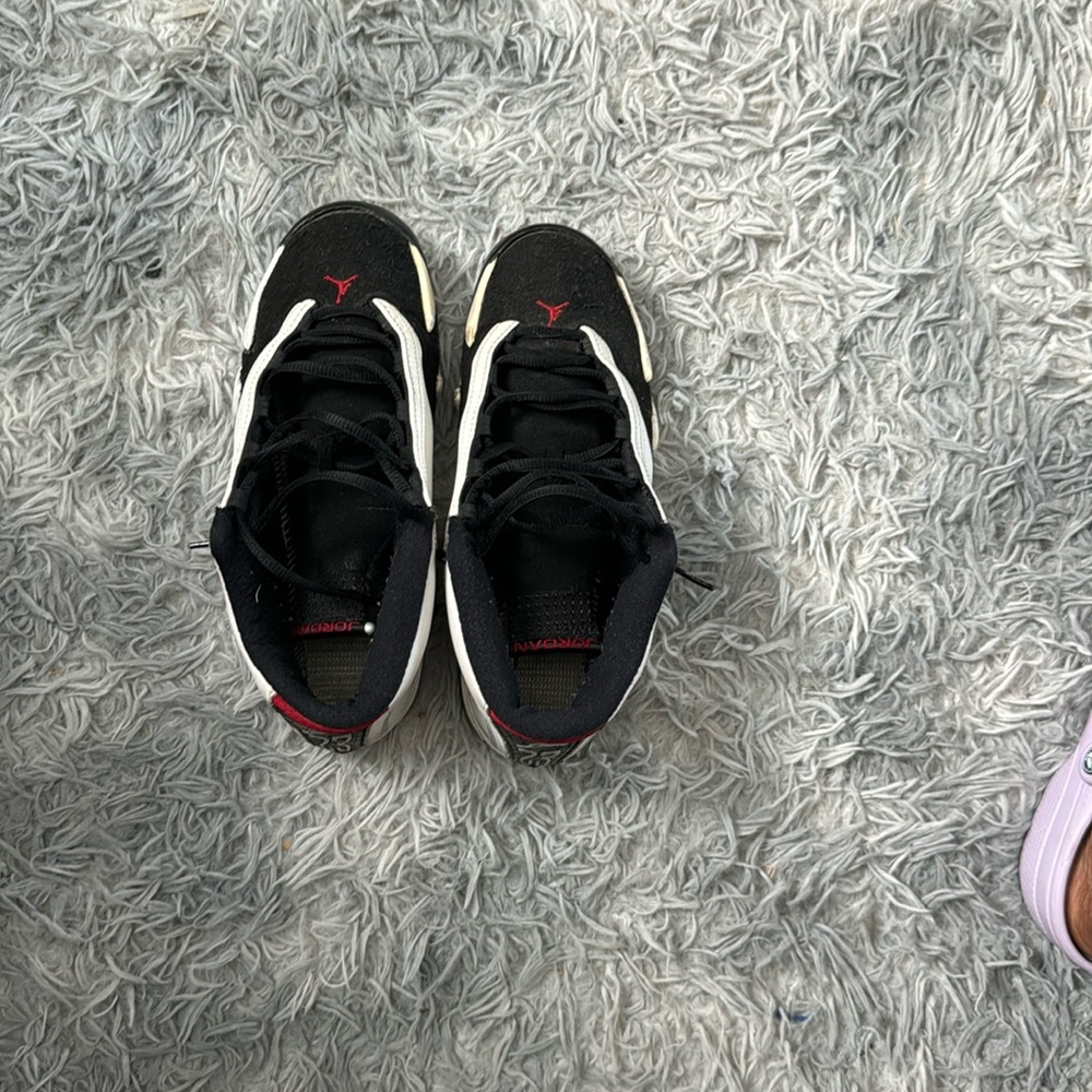 air jordan 14s black white with a little red. size 6Y